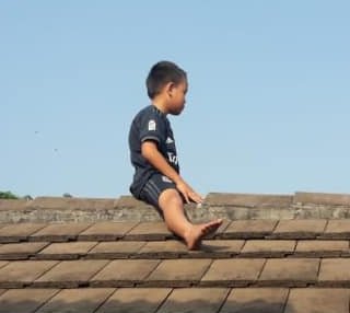 Boy on roof